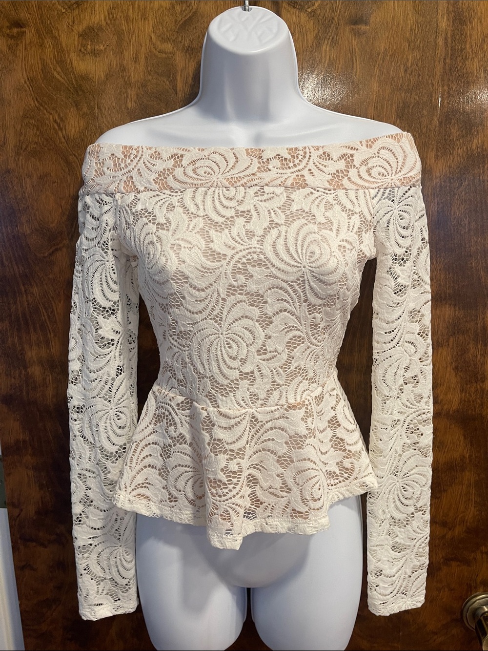 BCBGMaxAzria Off-Shoulder Lace Peplum Blouse in Cream